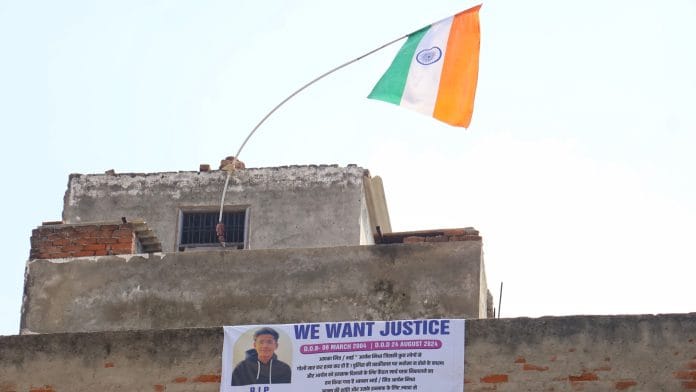 Poster hanging from the terrace reads “We Want Justice” | Photo: Manisha Mondal | ThePrint