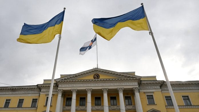 Ukrainian flags fly in honour of Ukraine's Independence Day at the Senate Square in front of the Government Palace in Helsinki, Finland, August 24, 2024. Lehtikuva/Jussi Nukari/via REUTERS/File Photo