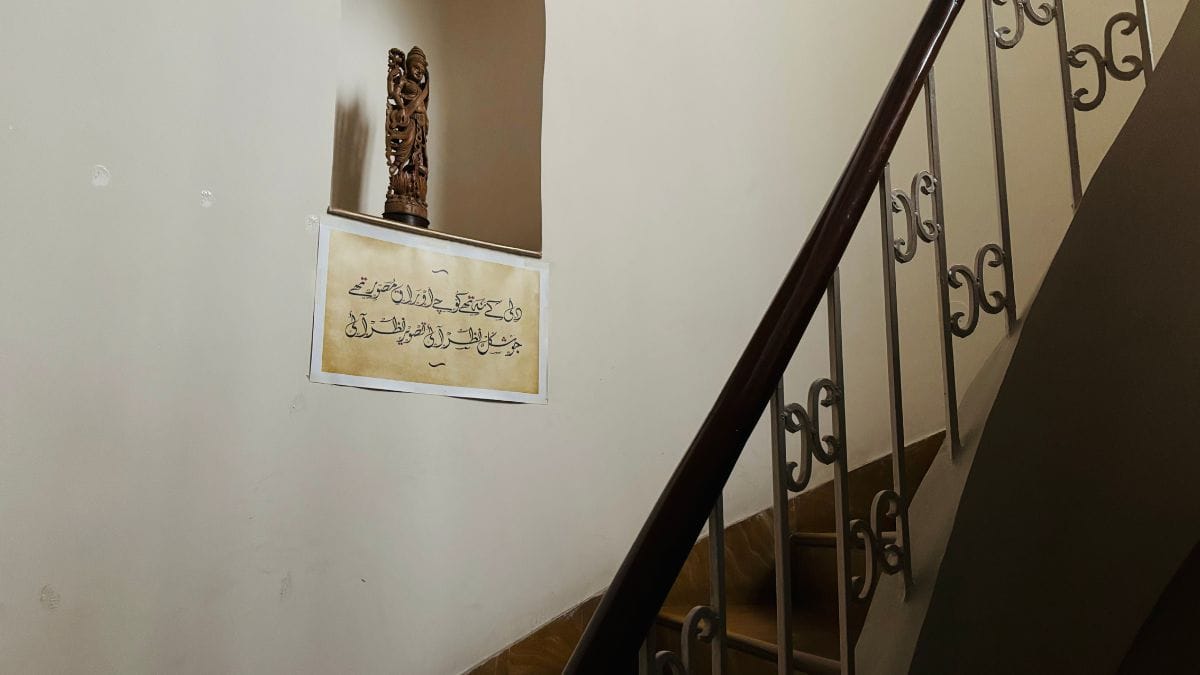 An Urdu couplet by poet Mir Taqi Mir in Swapna Liddle's home | Photo: Vandana Menon, ThePrint