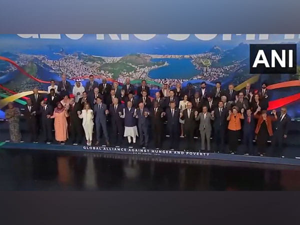 PM Modi and other G20 leaders pose for a family photo at Summit
