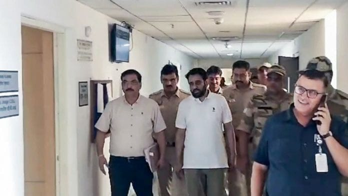 A file photo of Aam Aadmi Party (AAP) MLA Amanatullah Khan being produced before the Rouse Avenue Court, in New Delhi. | ANI