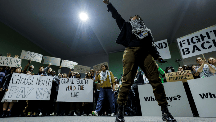 Activists shout slogans during a protest action at the COP29 United Nations climate change conference, in Baku, Azerbaijan, 23 November | Reuters/Maxim Shemetov