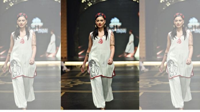 A model walks the Ramp in a Mohsin Sayeed kurta embroidered with Arundhati Roy’s face | Photo: By special arrangement