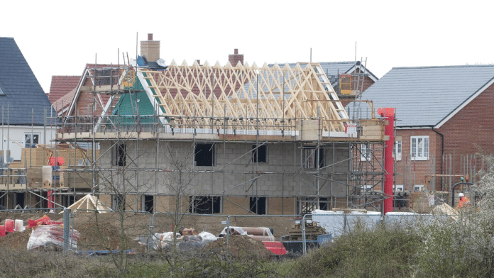 A new-build house under construction in Wymondham, Norfolk | Wikimedia Commons