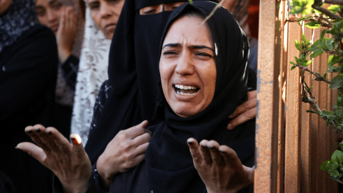 A woman mourns during the funeral of Palestinians killed in Israeli strike, in Khan Younis in the southern Gaza Strip, 21 November 2024 | Hatem Khaled | Reuters