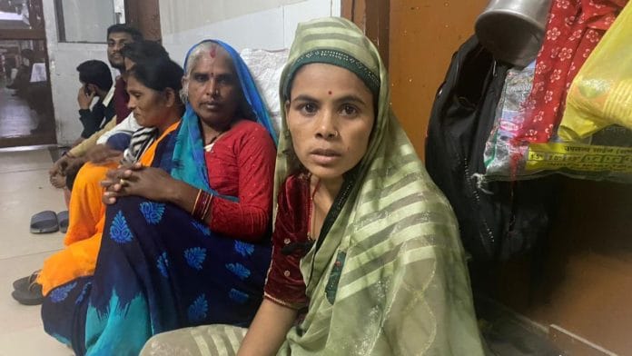 Poonam, mother of an 18-day old, rescued from the fire and admitted to the paediatric ward of Maharani Laxmi Bai Medical College in Jhansi, in the waiting area | Photo: Shikha Salaria, ThePrint