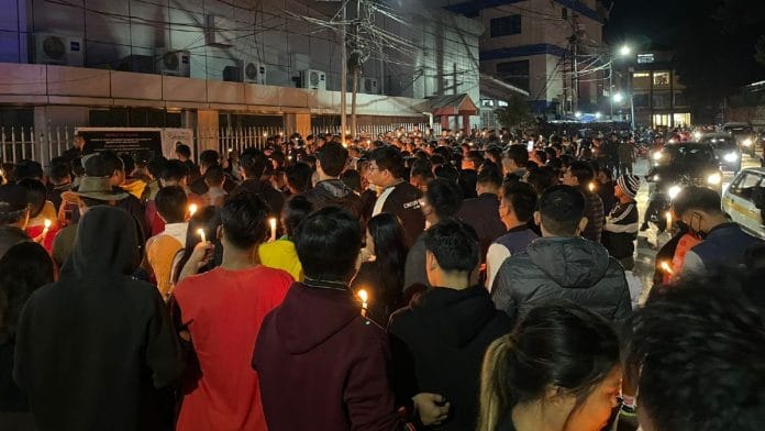 Candlelight vigil organised by Mizo Defence League in Aizawl, Friday | By special arrangement