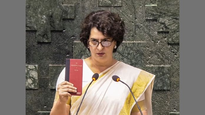 Congress leader Priyanka Gandhi Vadra takes oath as a Member of Parliament in the Lok Sabha during the Winter session of Parliament, in New Delhi, Thursday | PTI