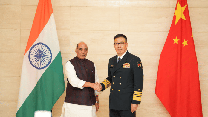 India's Defence Minister Rajnath Singh meets Chinese Defence Minister Admiral Dong Jun