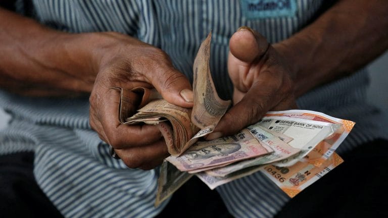Rupee weakens to record low of 84.37 against dollar, logs worst week in 5 months