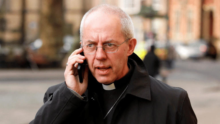 Church of England faces pressure over abuse scandal after Archbishop quits