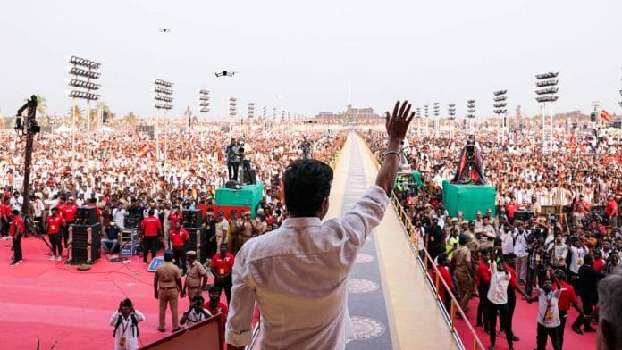 Vijay, founder of Tamilaga Vettri Kazhagam, waves to the crowd during his party's first political rally at Vikravandi last month | Photo: ANI