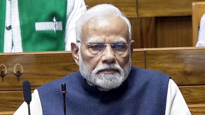 Prime Minister Narendra Modi in Lok Sabha during the discussion on the 75th anniversary of the adoption of the Constitution of India in the ongoing Winter Session of Parliament, in New Delhi on Saturday. (ANI Photo/SansadTV)