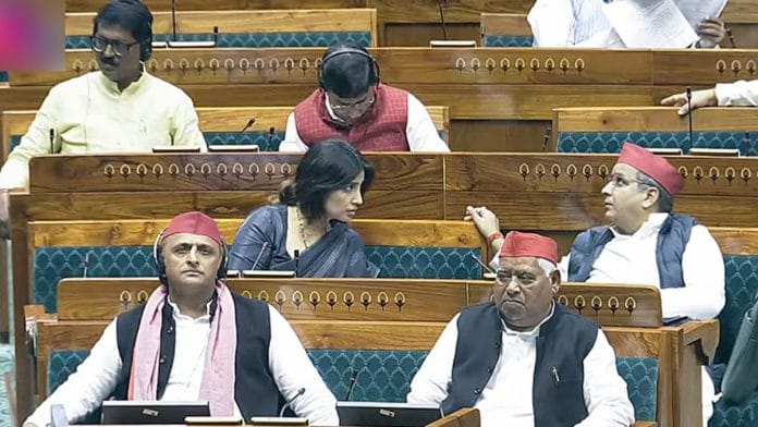 Samajwadi Party (SP) MPs Akhilesh Yadav, and Awadhesh Prasad during the Winter session of Parliament, in New Delhi Tuesday. | ANI