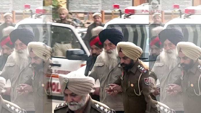 Narain Singh Chaura being escorted to a court in Amritsar on Sunday | ANI