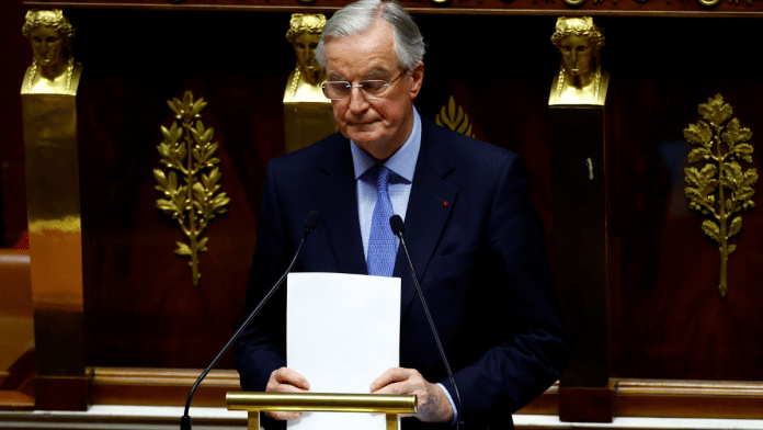 French Prime Minister Michel Barnier reacts after he delivered a speech during a debate on two motions of no-confidence against the French government in the National Assembly in Paris Thursday | Reuters/Sarah Meyssonnier