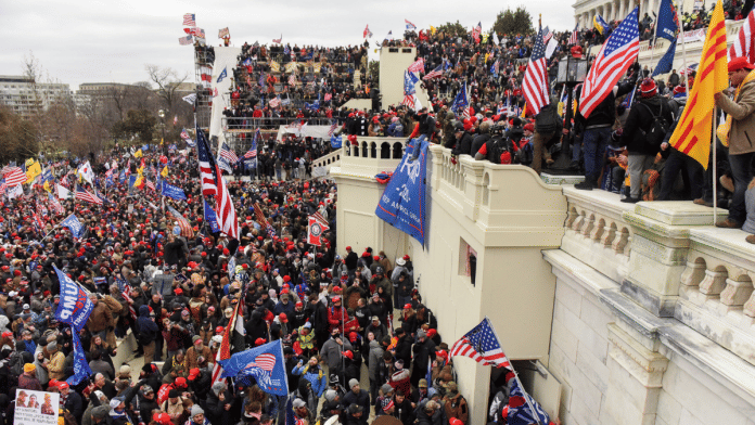 Supporters of U.S. President Donald Trump gather in front of the U.S. Capitol Building in Washington, U.S. on 6 January 2021. | Stephanie Keith | Reuters