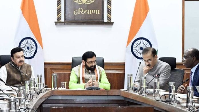 Haryana CM Nayab Saini with Rajesh Khullar (in grey) | Photo: Haryana PR department