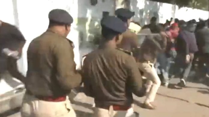 Police resorting to lathi-charge outside BPSC office in Patna, Friday | X @ANI