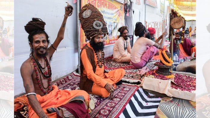 Sadhus inside tents on the Mahakumbh premises | ANI