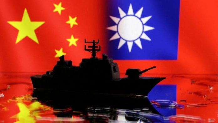 Representational Image | A Navy miniature is seen in front of displayed Chinese and Taiwanese flags in this illustration | Reuters/Dado Ruvic/Illustration
