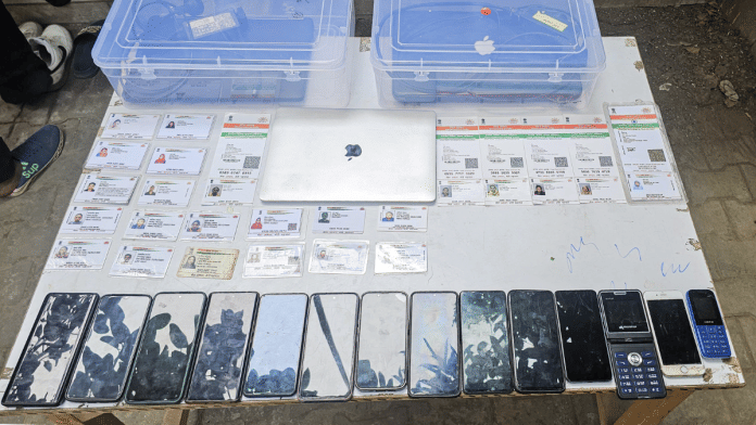 Fake Aadhaar cards, mobile phones and other documents seized by Delhi Police in connection with probe against illegal Bangladeshi immigrants | ANI File