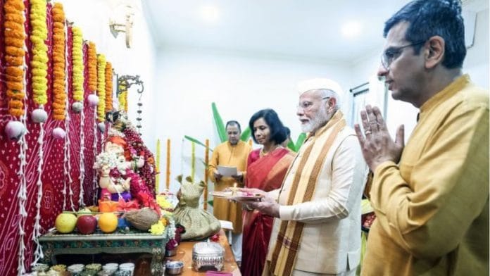 File photo of PM Narendra Modi at CJI Chandrachud's residence in New Delhi | ANI
