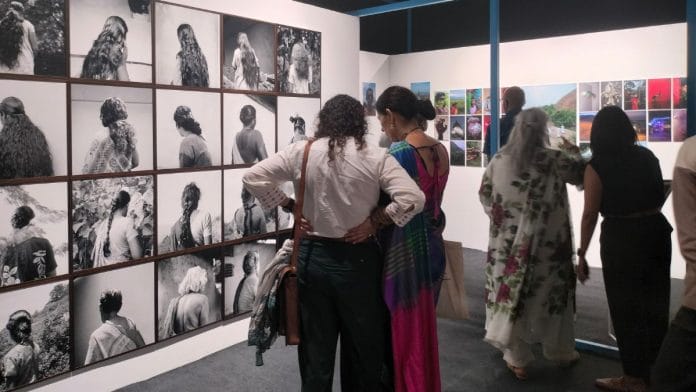 Spectators at the Chennai Photo Biennale exhibition