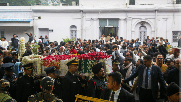 Mortal remains of former Prime Minister Dr Manmohan Singh being taken inside the AICC headquarters | ThePrint photo by Suraj Singh Bisht
