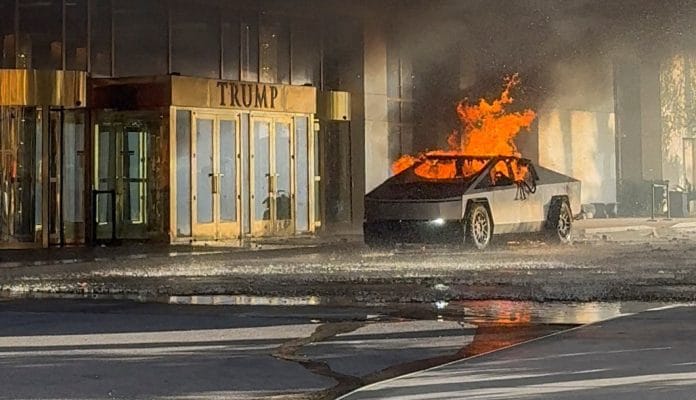 Flames rise from a Tesla Cybertruck after it exploded outside the Trump International Hotel Las Vegas, in Las Vegas, Nevada, U.S., January 1, 2025 in this screengrab taken from a social media video. Alcides Antunes/via Reuters
