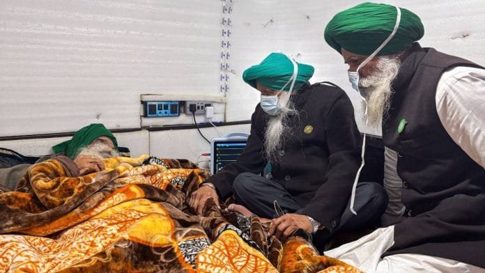 Members of Samyukt Kisan Morcha (SKM) meet farmer leader Jagjit Singh Dallewal at the Khanauri border in Sangrur Friday | Photo: ANI