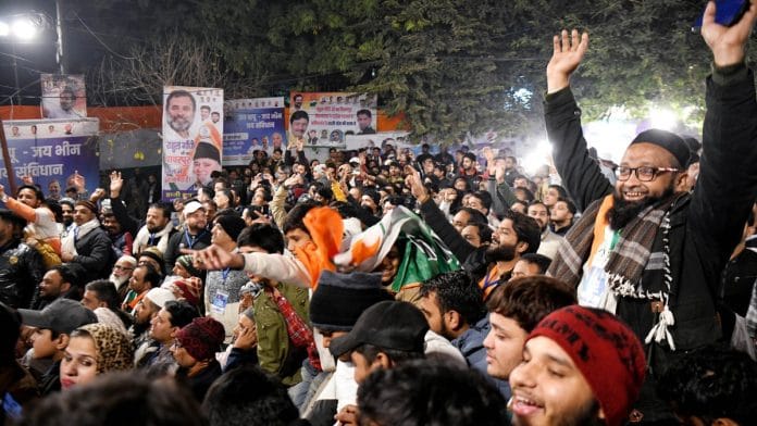 Congress supporters cheer during Rahul Gandhi's public meeting in Delhi's Seelampur, on 13 January 2024 | ANI/Ishant