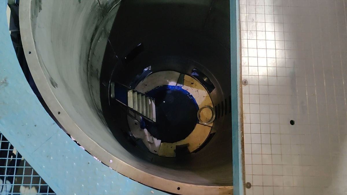 The shaft of the drop tower with an airbag below to protect the capsule as it falls from a height