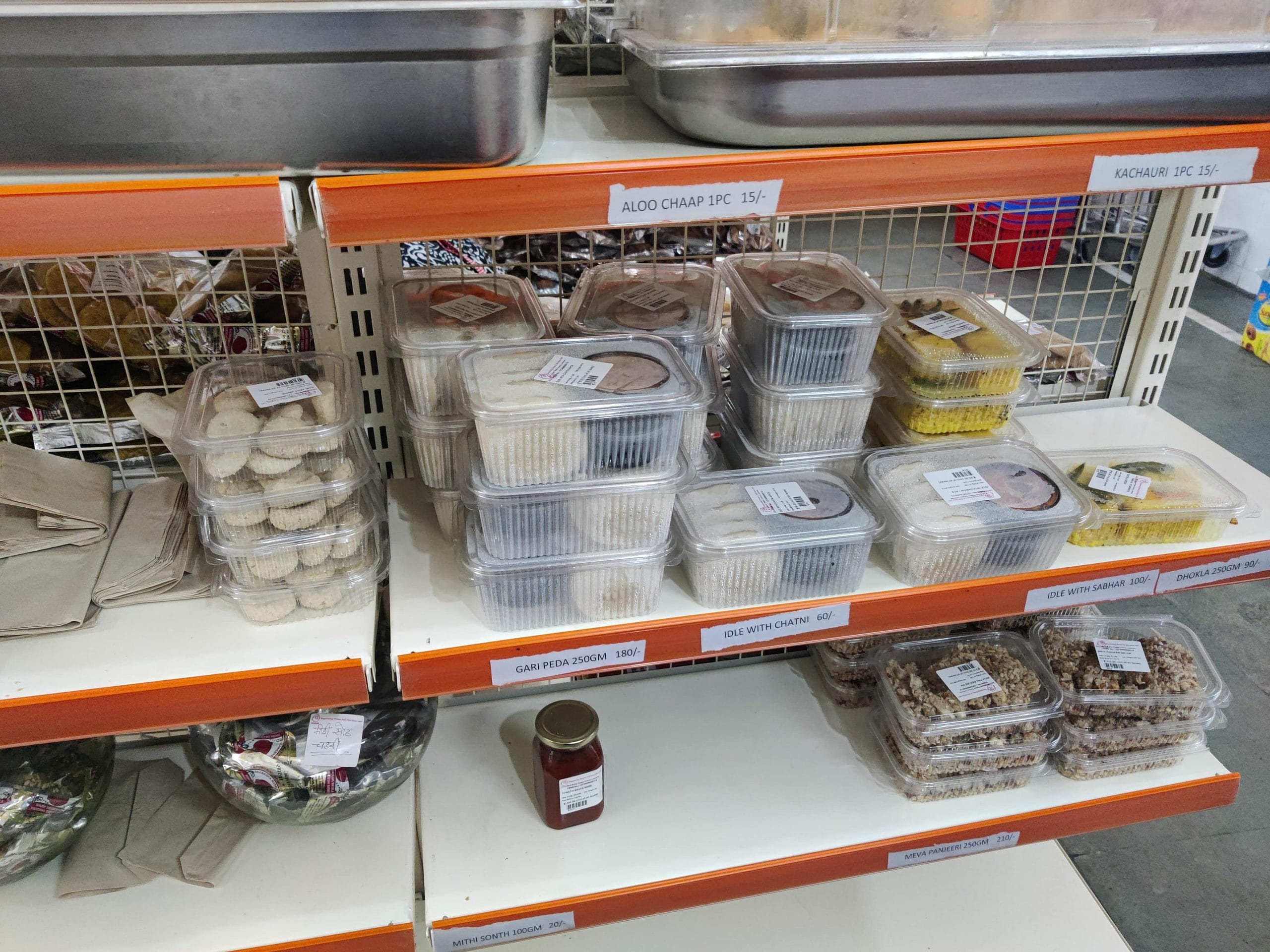 The Akanksha Masala Mathri Kendra in Lucknow has designated racks that are replenished every two hours as customers keep buying items | Nootan Sharma, ThePrint 