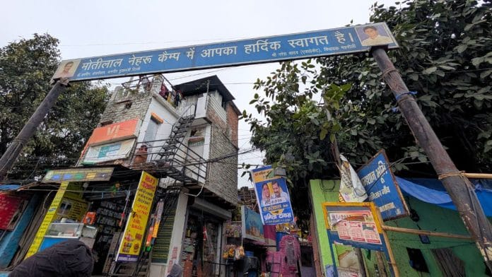 AAP national convenor Arvind Kejriwal seen on posters at the entrance to Mehrauli's Motilal Nehru Camp, New Delhi. | Apoorva Mandhani | ThePrint