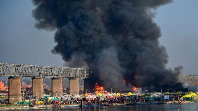 Smoke billows out after a fire broke out in tents during Mahakumbh, at Sangam in Prayagraj, Sunday/PTI Photo