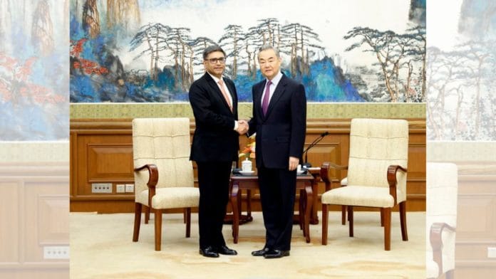 Indian Foreign Secretary Vikram Misri and Chinese Foreign Minister Wang Yi in Beijing. | China's Ministry of Foreign Affairs website