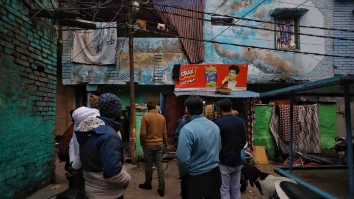 People gather outside Shahedeen Qureshi's house in Moradabad, Wednesday | Manisha Mondal | ThePrint