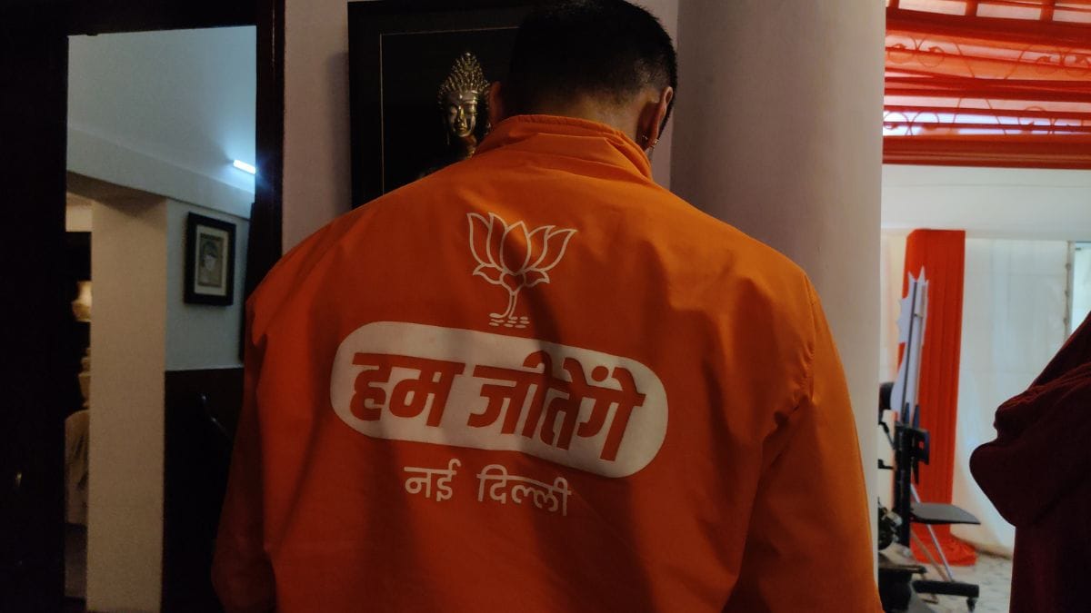A BJP worker on the campaign trail. | ThePrint