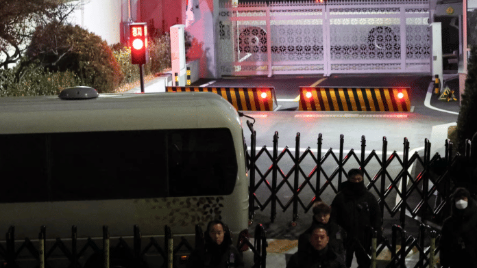 Buses block the entrance of the impeached South Korean President Yoon Suk Yeol's official residence, as Yoon faces potential arrest after a court on Tuesday approved a warrant for his arrest, in Seoul, South Korea, on 3 January 2025. | Yonhap via Reuters
