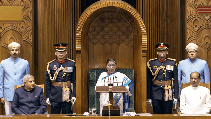 President Droupadi Murmu addresses the joint sitting of both Houses of Parliament on the first day of the Budget Session, in New Delhi, Friday, on 31 January 2025. Vice President and Rajya Sabha Chairman Jagdeep Dhankhar and Lok Sabha Speaker Om Birla are also seen. | Screen grab | Sansad TV via PTI Photo