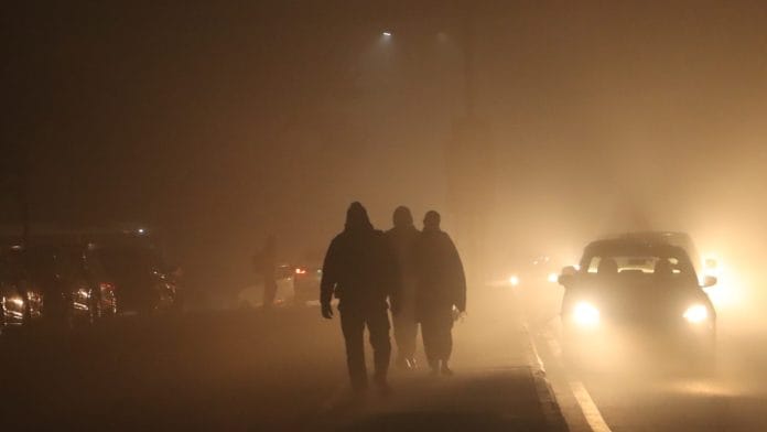 Commuters amid low visibility due to fog on a cold winter morning, in New Delhi, Friday, Jan. 10, 2025 | PTI