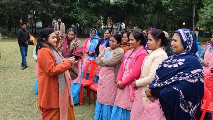 IAS Rashmi Singh (left, in orange), current UP IASOWA president, interacts with Akanksha workers. Her presidency has transformed the women empowerment programme, making it more than a benign charity initiative for the wives of IAS officers | By special arrangement