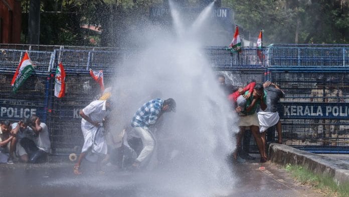 Youth Congress workers march towards Kerala Assembly against the Cabinet decision to grant licence to a brewery and distillery in Palakkad district | Photo: ANI