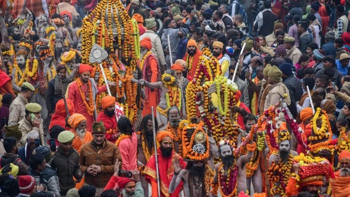 Ascetics of ‘Shri Taponidhi Anand Akhara Panchayati’ take part in the 'Peshwai' procession, which marks the arrival of ascetics and other members of an 'akhara' or sect for Maha Kumbh Mela 2025, in Prayagraj Monday | ANI