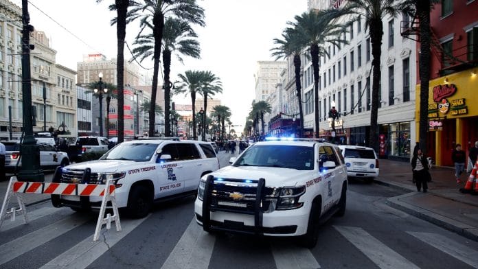 Louisiana State Police vehicles operate near the site where people were killed by a man driving a truck in an attack during New Year's celebrations, in New Orleans, Louisiana, U.S. January 1, 2025 | Reuters