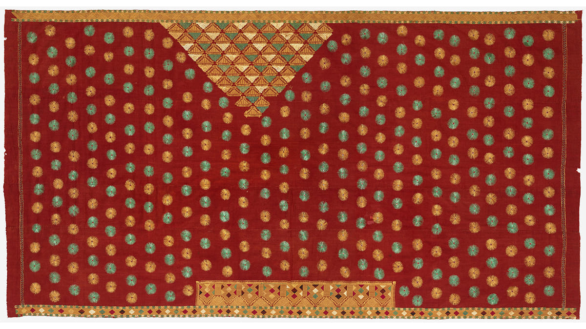 Phulkari made for a bride, with a large embroidered triangle, Punjab, India, 20th century, Handspun cotton plain weave (khaddar) with silk embroidery in running, darning, pattern darning, herringbone, split, stem and cross stitches, 287 × 147.3 cm, Image courtesy of Philadelphia Museum of Art