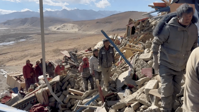 Rescue teams work amidst rubble in the aftermath of an earthquake in a location given as Shigatse City, Tibet Autonomous Region, China, in this screengrab obtained from a handout video released on 7 January 2025. | Tibet Fire and Rescue | Handout via Reuters