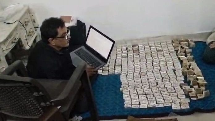 Lokayukta conducting a raid on the residence of the former transport department constable in Bhopal last month | ANI