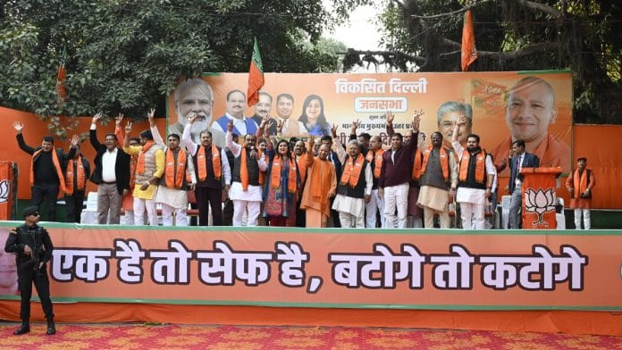 UP CM Yogi Adityanath with Lok Sabha MP Bansuri Swaraj and other leaders at a rally in Karol Bagh ahead of Delhi elections | Suraj Singh Bisht | ThePrint